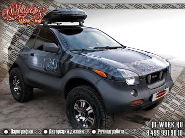 Isuzu VehiCross. Аэрография салона и багажника. Фото 3