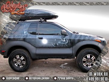 Isuzu VehiCross. Аэрография салона и багажника. Фото 4